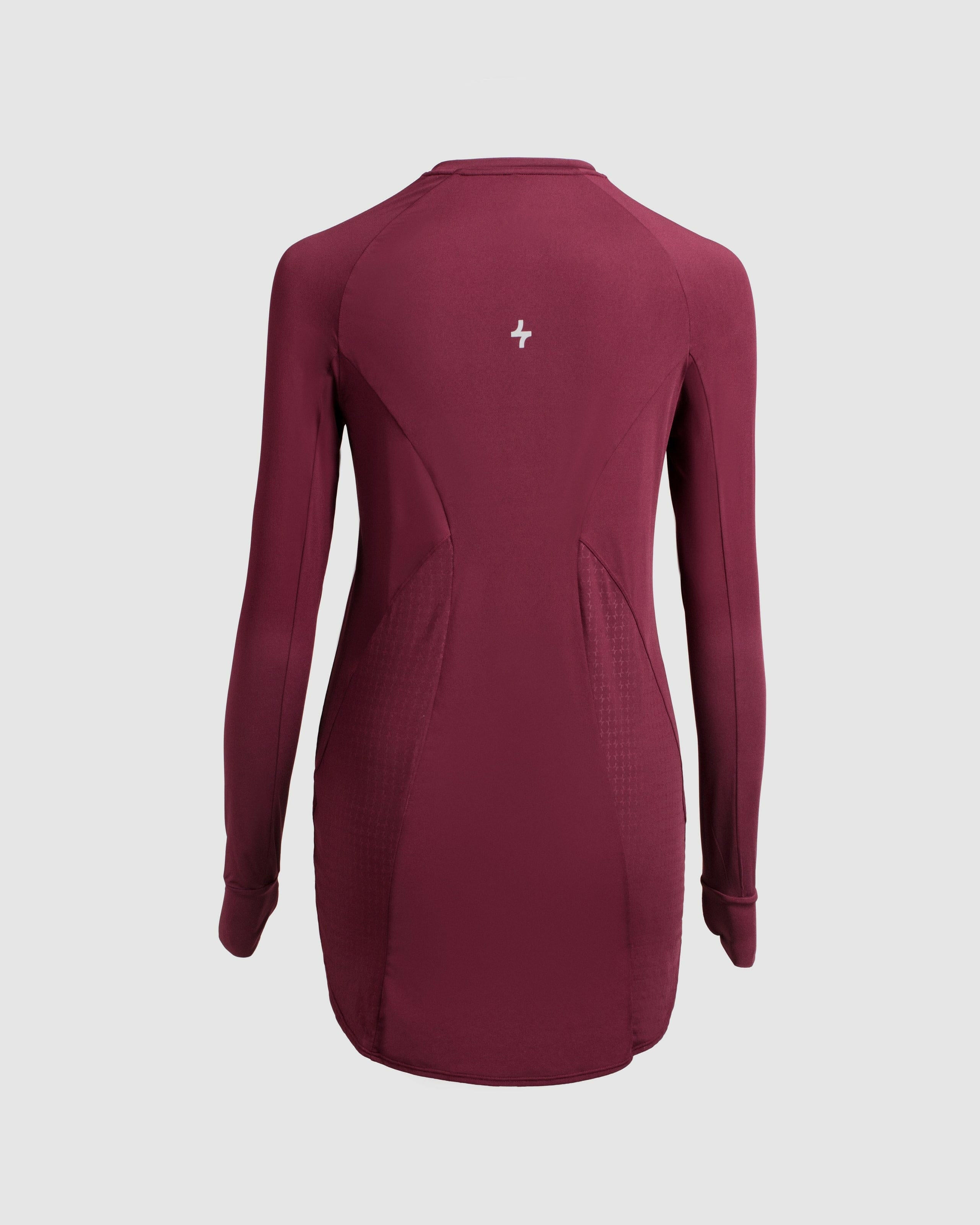 Back view of a modest maroon MOD LONG SLEEVE T-SHIRT by Qynda with mesh panels under the arms, featuring a Qynda logo centered below the neck and crafted from super light material.