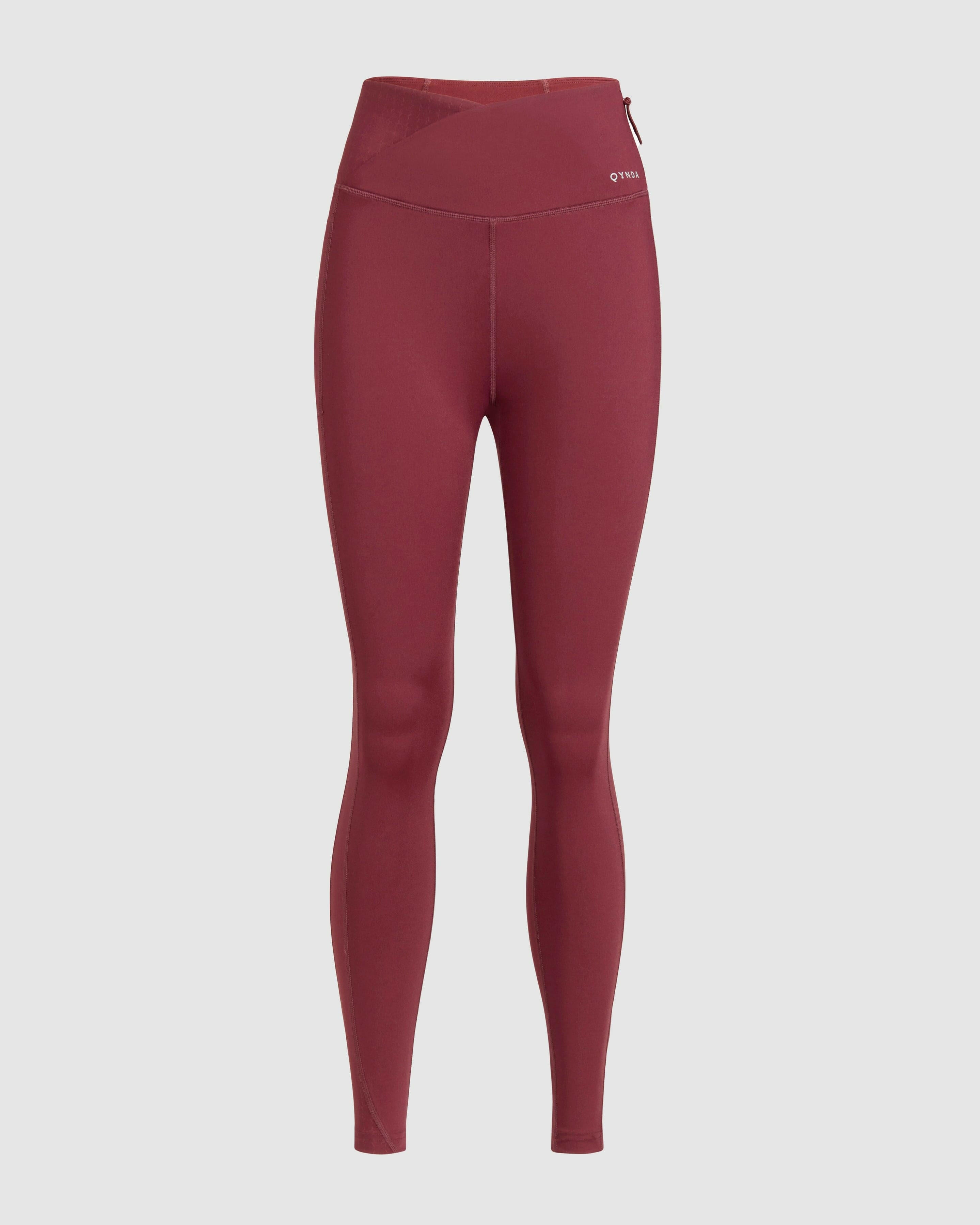 Stylish Maroon LADINA LEGGINGS by Qynda with a high waistband and better-fitting, zipper detail on white background.