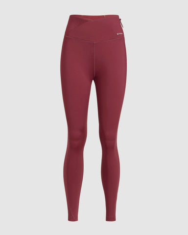 Stylish Maroon LADINA LEGGINGS by Qynda with a high waistband and better-fitting, zipper detail on white background.