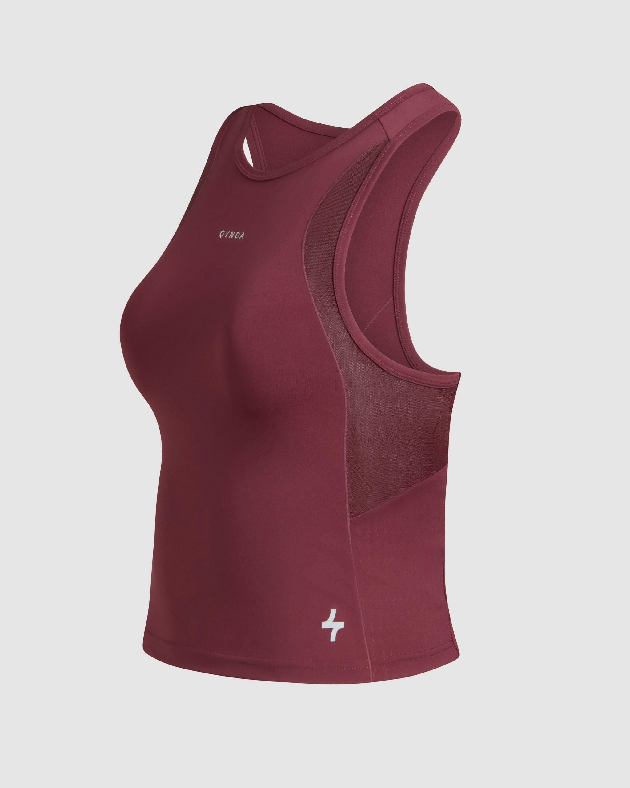 Side view of Maroon colored BADA TANK TOP with qynda logo, high neckline and mesh back and sides isolated on a white background.