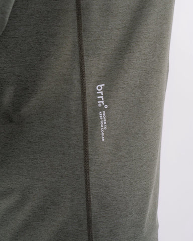 A close-up view of a gray, moisture-resistant garment with a zipper and a subtle logo, emphasizing minimalist design and details.