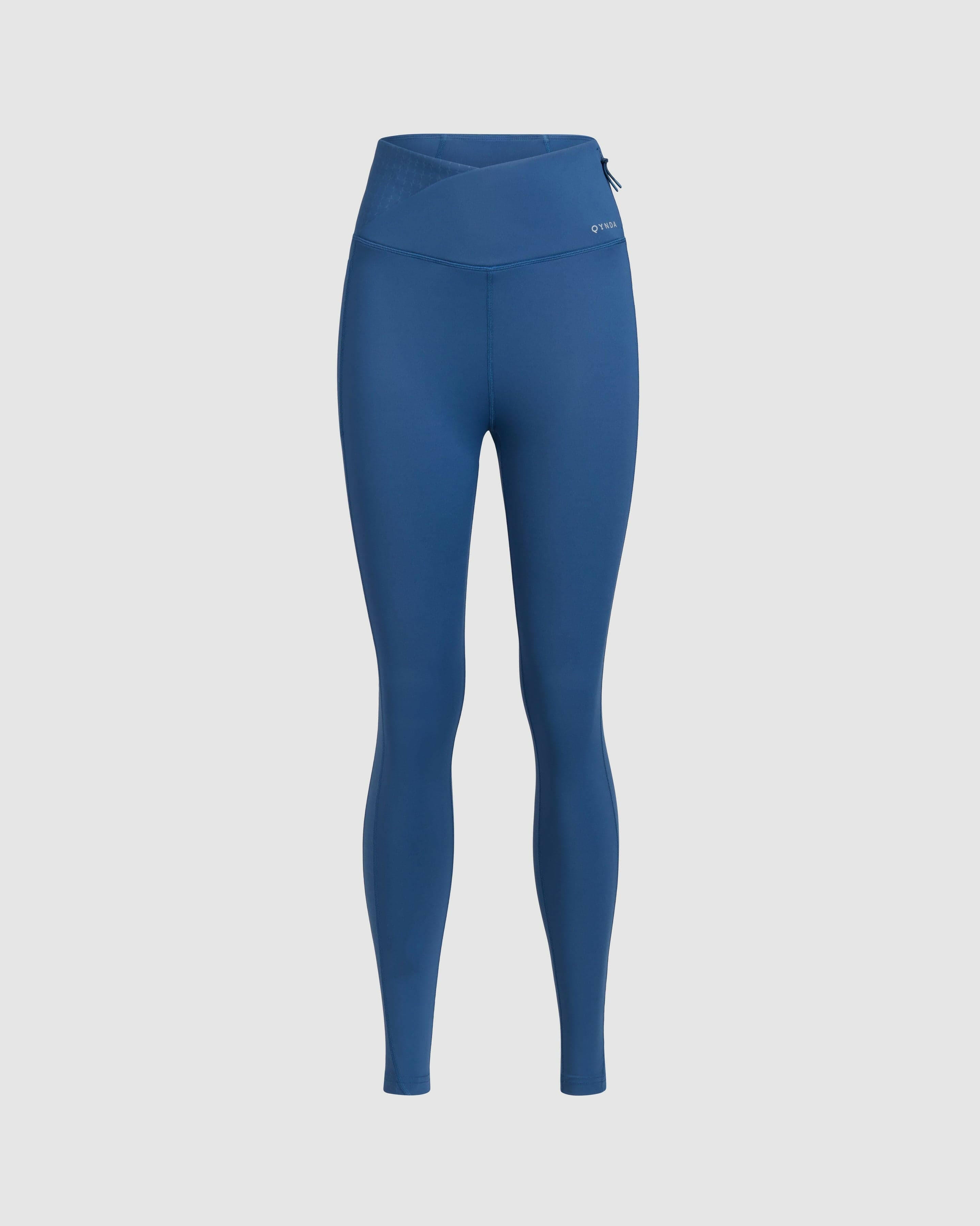 Dark Denim athletic LADINA LEGGINGS with a high-waist design, featuring a Qynda brand logo.
