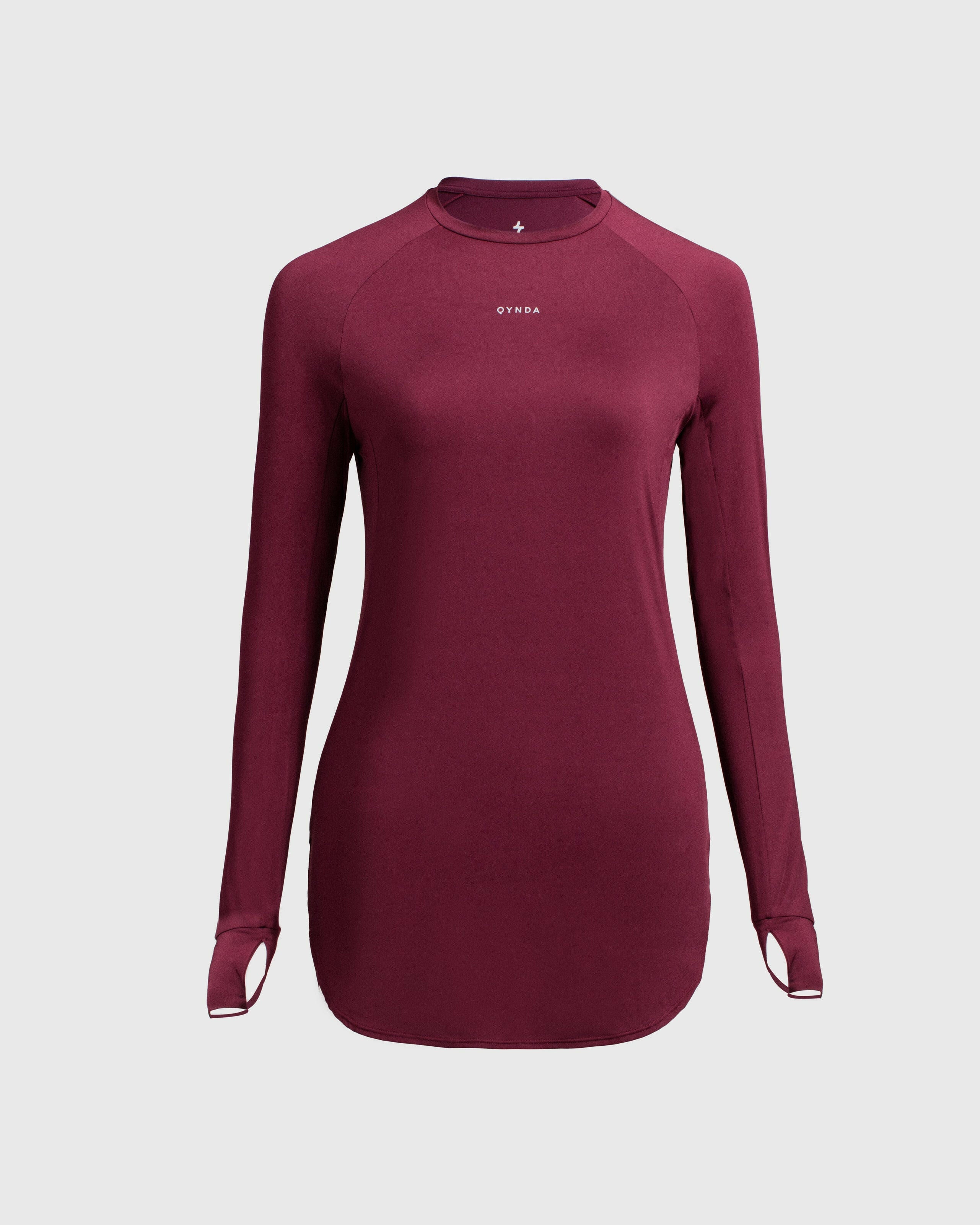 A, modest maroon MOD LONG SLEEVE T-SHIRT by Qynda with a fitted design, prominently displaying a small Qynda logo on the chest.